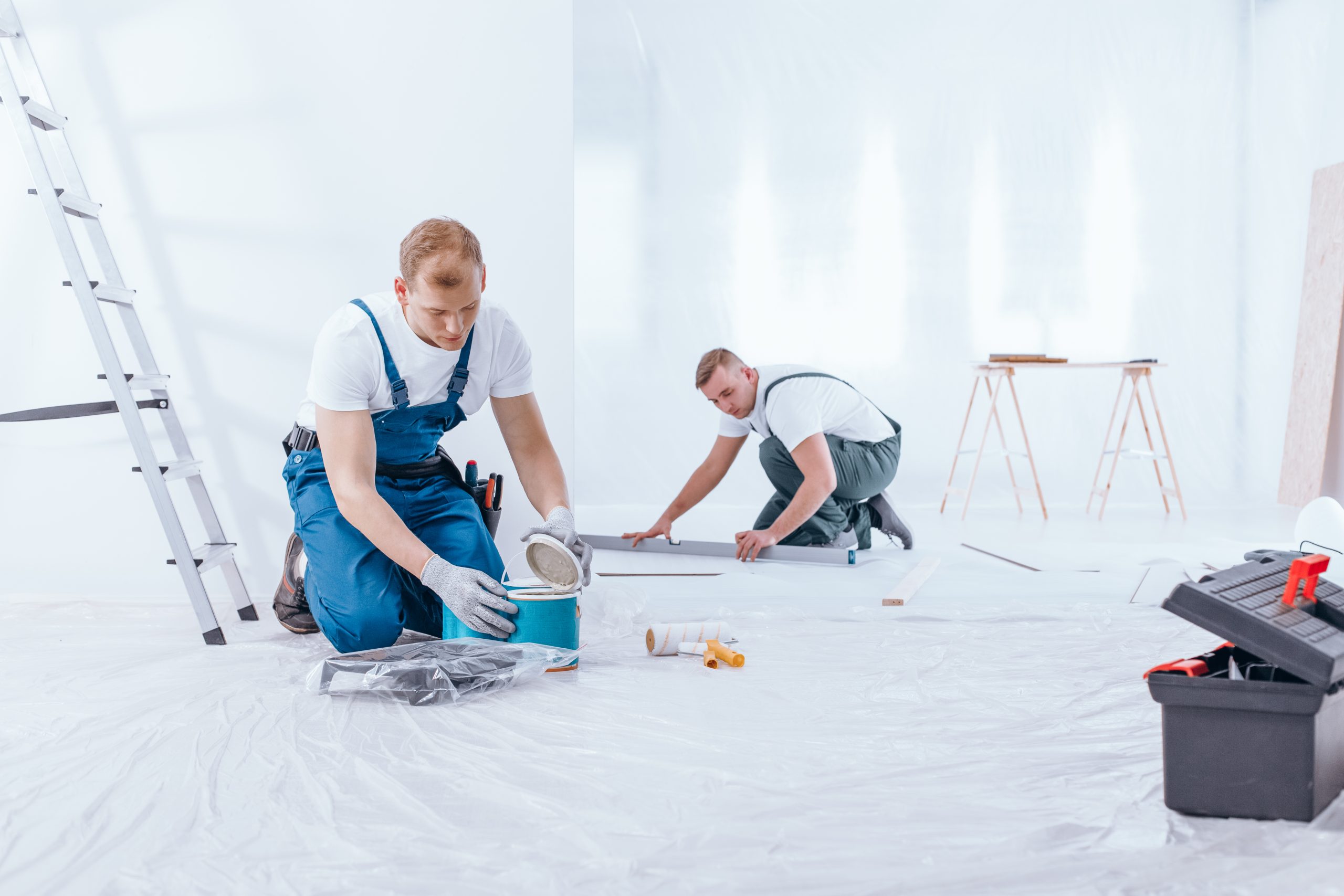 painter during interior finishing work 2022 03 30 20 23 47 utc scaled - Home